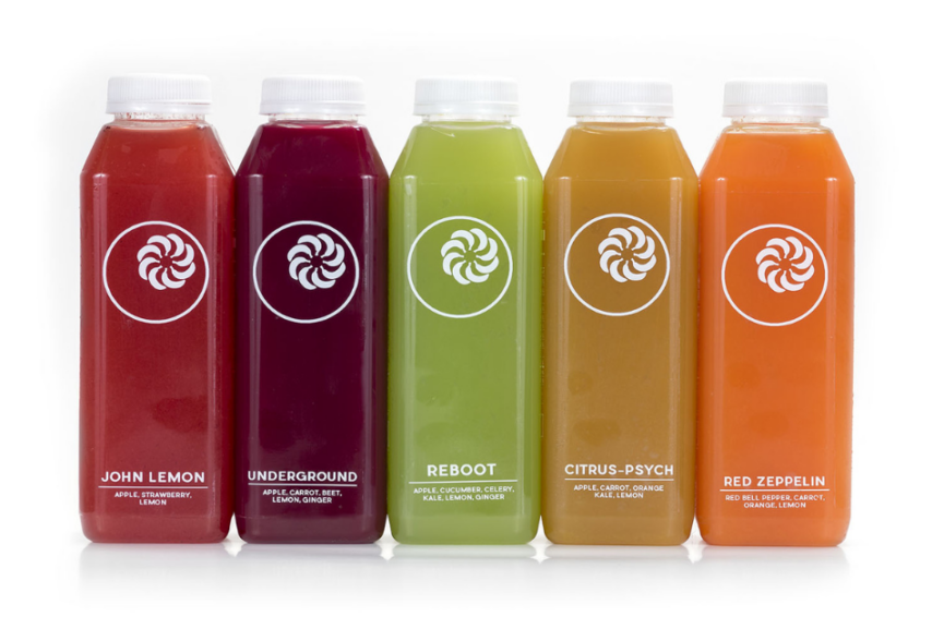 colorful fresh cold pressed juice cleanse bottles